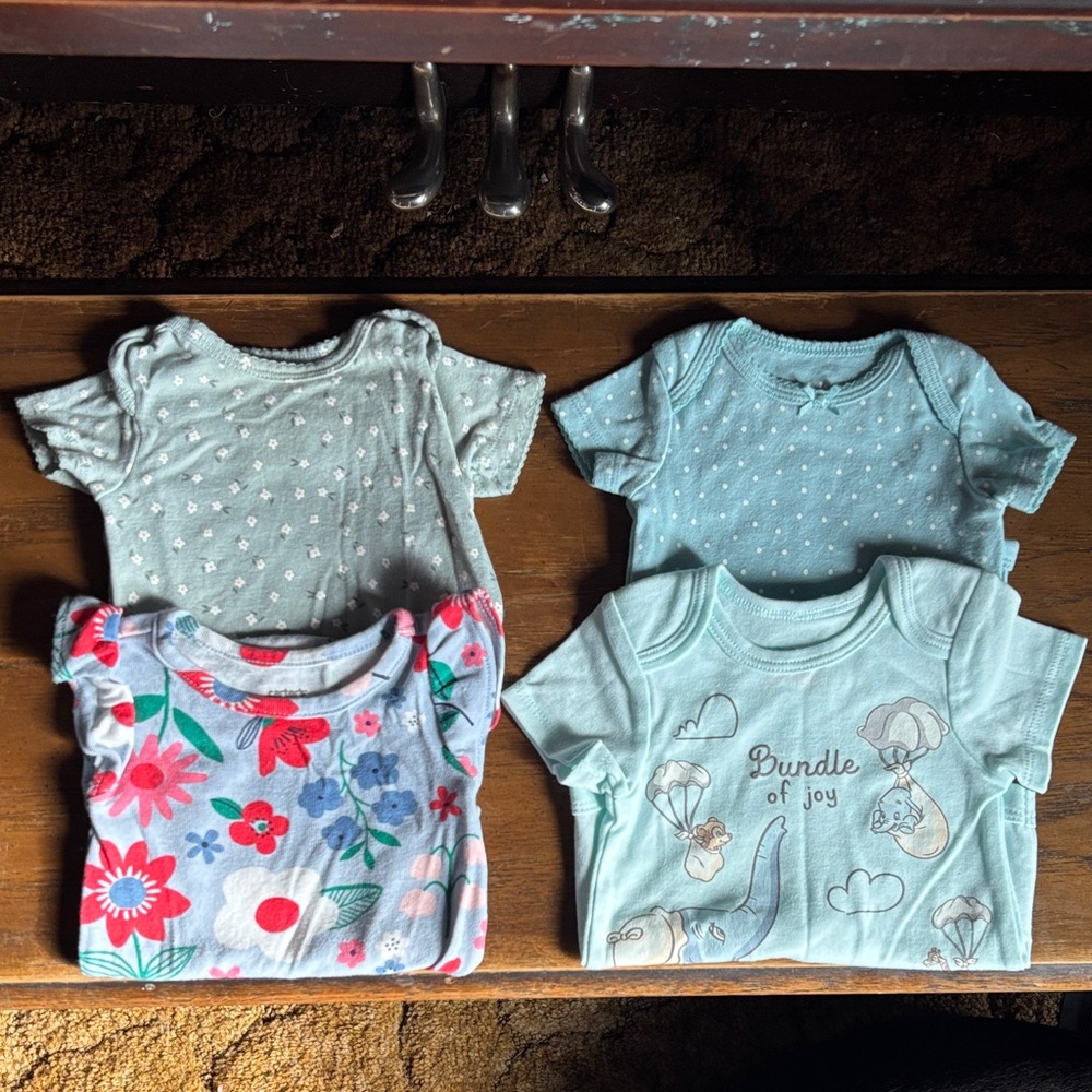 Lot of 4 Blue and Floral Bodysuits 0-3 mos